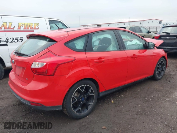 2014 Ford Focus SE with VIN 1FADP3K29EL111106, listed as a IAAI auction lot 41070212 with 72,730 mi miles. Bid and sale history available at carsss.com. Image 4.