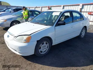 2002 Honda Civic LX with VIN 2HGES16672H596631, listed as a IAAI auction lot 41703532 with 172,311 mi miles. Bid and sale history available at carsss.com. Image 2.
