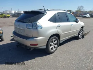 2008 Lexus RX with VIN 2T2HK31U38C057662, listed as a IAAI auction lot 41977657 with 178,847 mi miles. Bid and sale history available at carsss.com. Image 4.