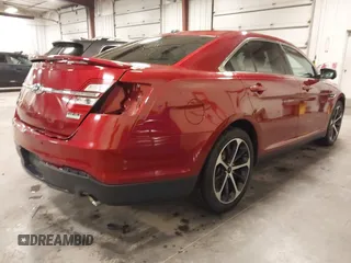 2014 Ford Taurus SHO with VIN 1FAHP2KT9EG130834, listed as a IAAI auction lot 41748199 with 98,857 mi miles and . Bid and sale history available at carsss.com. Image 4.