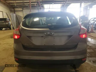 2014 Ford Focus Titanium z VIN 1FADP3N27EL462950, wystawiony jako Copart lot #65207155 z przebiegiem 34 058 mil mil oraz Szkoda całkowita • Salvage title. Historia ofert i sprzedaży dostępna na DreamBid. Obrazek 6.