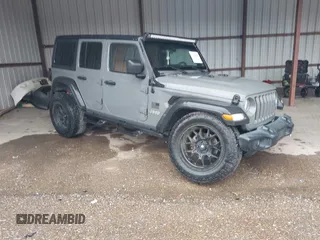 2020 Jeep Wrangler Unlimited Sport S z VIN 1C4HJXDG1LW103364, wystawiony jako IAAI lot #41541954 z przebiegiem 57 735 mil mil oraz . Historia ofert i sprzedaży dostępna na DreamBid. Obrazek 1.