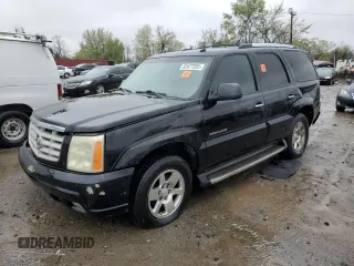 2002 Cadillac Escalade z VIN 1GYEK63N42R274014, wystawiony jako Copart lot #52477205 z przebiegiem Nie podano mil oraz Szkoda całkowita • Salvage title. Historia ofert i sprzedaży dostępna na DreamBid. Obrazek 1.