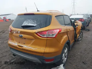 2016 Ford Escape SE with VIN 1FMCU9G95GUB74347, listed as a IAAI auction lot 41560409 with 123,464 mi miles. Bid and sale history available at carsss.com. Image 4.