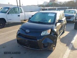 2011 Scion xD with VIN JTKKU4B46B1009909, listed as a IAAI auction lot 41959824 with 185,764 mi miles. Bid and sale history available at carsss.com. Image 6.