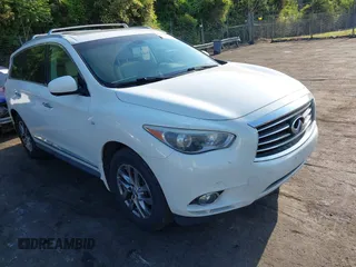 2015 Infiniti QX60 z VIN 5N1AL0MM8FC517929, wystawiony jako IAAI lot #42118295 z przebiegiem 104 188 mil mil oraz . Historia ofert i sprzedaży dostępna na DreamBid. Obrazek 1.