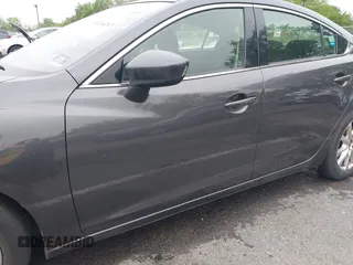 2014 Mazda 6 i Sport with VIN JM1GJ1U52E1102800, listed as a IAAI auction lot 42266283 with 103,886 mi miles and . Bid and sale history available at DreamBid. Image 6.
