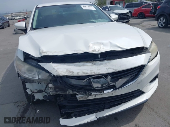 2016 Mazda Mazda6 i Touring with VIN JM1GJ1V57G1429887, listed as a IAAI auction lot 42029170 with 140,519 mi miles. Bid and sale history available at carsss.com. Image 6.