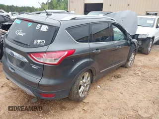 2015 Ford Escape Titanium with VIN 1FMCU9J90FUC14650, listed as a IAAI auction lot 41992858 with 158,963 mi miles and . Bid and sale history available at DreamBid. Image 4.