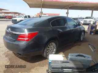 2014 Buick LaCrosse Leather with VIN 1G4GB5G39EF288087, listed as a IAAI auction lot 41897156 with 156,413 mi miles. Bid and sale history available at carsss.com. Image 4.