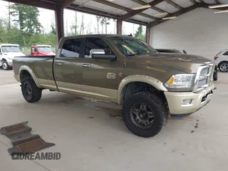 2014 Ram 2500 Laramie Longhorn z VIN 3C6UR5LL6EG306964, wystawiony jako IAAI lot #42420311 z przebiegiem 226 722 mil mil oraz . Historia ofert i sprzedaży dostępna na DreamBid. Obrazek 1.