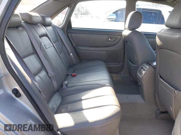 2003 Toyota Avalon XL z VIN 4T1BF28B03U321618, wystawiony jako IAAI lot #42297842 z przebiegiem 142 154 mil mil oraz . Historia ofert i sprzedaży dostępna na DreamBid. Obrazek 8.