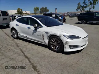 2019 Tesla Model S 75D с VIN 5YJSA1E26KF311667, выставлен на аукционе Copart как лот 56960275 с пробегом 108 495 миль миль и Списание • Salvage title. История ставок и продаж доступна на DreamBid. Изображение 4.