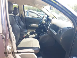 2015 Jeep Compass Latitude with VIN 1C4NJCEBXFD179373, listed as a IAAI auction lot 39380614 with 104,832 mi miles. Bid and sale history available at carsss.com. Image 5.