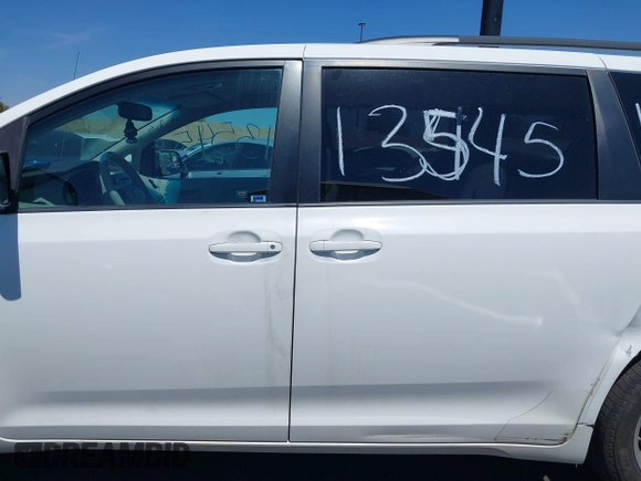 2012 Toyota Sienna LE AAS with VIN 5TDKK3DC4CS183817, listed as a IAAI auction lot 42013545 with 207,822 mi miles. Bid and sale history available at carsss.com. Image 14.