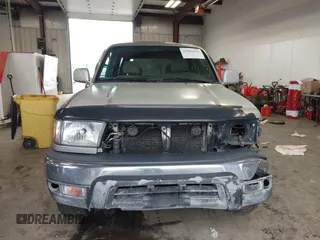 1999 Toyota 4Runner SR5 z VIN JT3HN86R8X0221532, wystawiony jako IAAI lot #41902556 z przebiegiem 406 602 mil mil oraz . Historia ofert i sprzedaży dostępna na DreamBid. Obrazek 13.