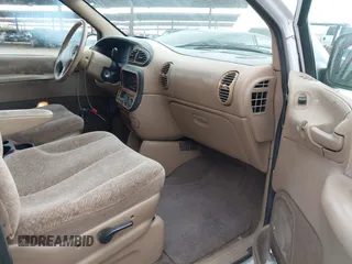 1999 Plymouth Voyager Grand SE z VIN 1P4GP44G5XB637050, wystawiony jako IAAI lot #41702235 z przebiegiem 335 309 mil mil oraz . Historia ofert i sprzedaży dostępna na DreamBid. Obrazek 5.