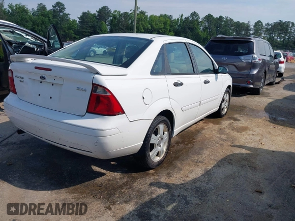 2005 Ford Focus S with VIN 1FAHP34N45W230950, listed as a IAAI auction lot 42467778 with 203,697 mi miles and . Bid and sale history available at DreamBid. Image 4.