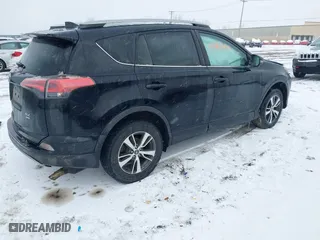 2018 Toyota RAV4 XLE with VIN 2T3RFREV8JW851250, listed as a IAAI auction lot 41164994 with 63,005 mi miles. Bid and sale history available at carsss.com. Image 4.