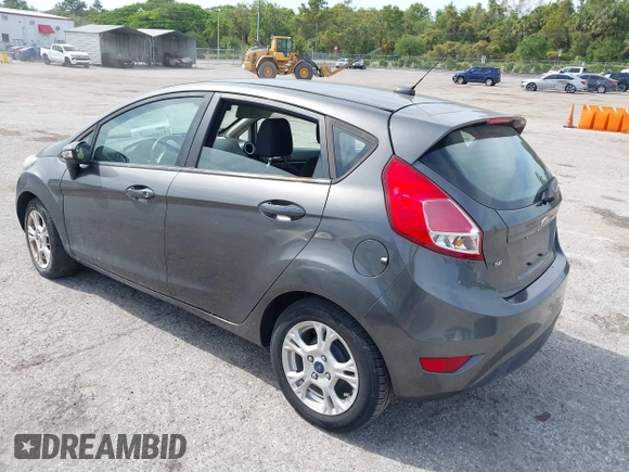 2016 Ford Fiesta SE with VIN 3FADP4EJ4GM129006, listed as a IAAI auction lot 42085892 with 146,044 mi miles. Bid and sale history available at carsss.com. Image 3.