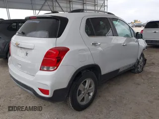 2020 Chevrolet Trax LT with VIN KL7CJLSBXLB010793, listed as a IAAI auction lot 41704879 with 124,915 mi miles and . Bid and sale history available at DreamBid. Image 4.