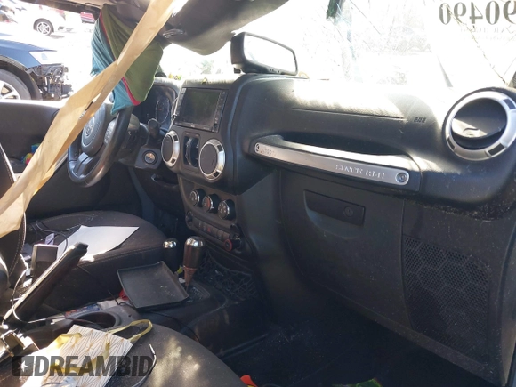 2014 Jeep Wrangler Unlimited Rubicon with VIN 1C4BJWFG3EL248164, listed as a IAAI auction lot 41290490 with 116,383 mi miles. Bid and sale history available at carsss.com. Image 5.