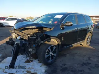 2017 Kia Sorento EX with VIN 5XYPHDA55HG233354, listed as a IAAI auction lot 41128779 with 122,058 mi miles and . Bid and sale history available at DreamBid. Image 2.