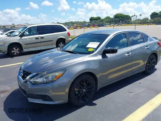2017 Nissan Altima S with VIN 1N4AL3AP0HC297523, listed as a IAAI auction lot 42525818 with 162,767 mi miles and . Bid and sale history available at DreamBid. Image 16.