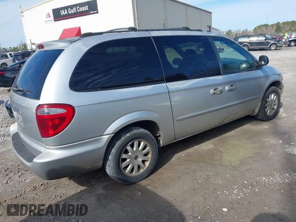 2003 Chrysler Town & Country LX with VIN 2C4GP44L03R203678, listed as a IAAI auction lot 41293296 with 210,827 mi miles and . Bid and sale history available at DreamBid. Image 4.
