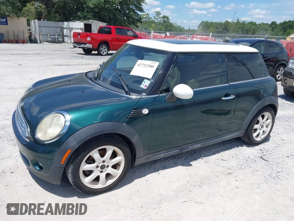 2010 MINI Hardtop with VIN WMWMF3C5XATZ23107, listed as a IAAI auction lot 42732300 with 100,747 mi miles and . Bid and sale history available at DreamBid. Image 2.