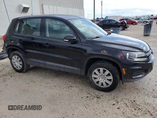 2014 Volkswagen Tiguan with VIN WVGCV3AX4EW526613, listed as a Copart auction lot 73949784 with 83,421 mi miles and Salvage Title. Bid and sale history available at DreamBid. Image 4.