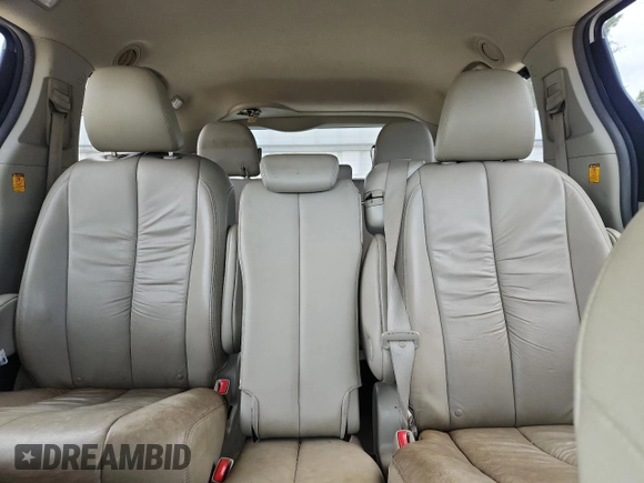 2011 Toyota Sienna XLE AAS с VIN 5TDYK3DC1BS017540, выставлен на аукционе Copart как лот 65177255 с пробегом 164 604 миль миль и Списание • Salvage title. История ставок и продаж доступна на DreamBid. Изображение 10.