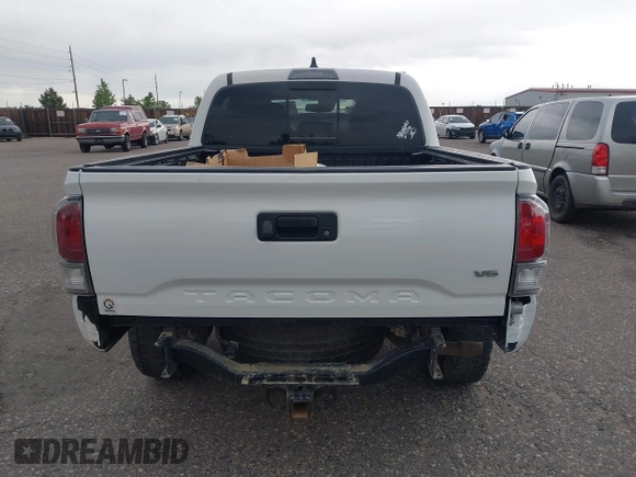 2020 Toyota Tacoma SR5 z VIN 5TFCZ5AN5LX242708, wystawiony jako IAAI lot #42356772 z przebiegiem 65 442 mil mil oraz . Historia ofert i sprzedaży dostępna na DreamBid. Obrazek 16.