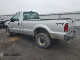 2002 Ford F-350 XL with VIN 1FTSF31F12EB21069, listed as a Copart auction lot 84287374 with 110,890 mi miles and Salvage Title. Bid and sale history available at DreamBid. Image 2.