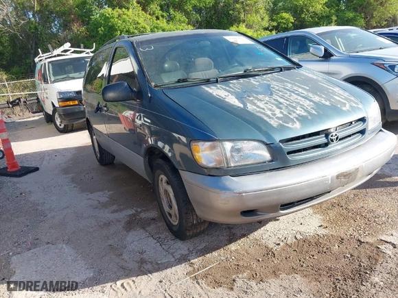 2000 Toyota Sienna LE with VIN 4T3ZF13C5YU217679, listed as a IAAI auction lot 42005053 with 198,953 mi miles. Bid and sale history available at carsss.com. Image 1.