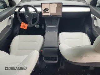 2022 Tesla Model Y Performance с VIN 7SAYGDEF0NF497582, выставлен на аукционе Copart как лот 65131685 с пробегом 50 948 миль миль и Чистый • Clean title. История ставок и продаж доступна на DreamBid. Изображение 8.