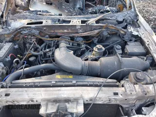 1998 Ford Expedition XLT with VIN 1FMRU17L3WLB67036, listed as a IAAI auction lot 41795100 with 272,500 mi miles. Bid and sale history available at carsss.com. Image 10.