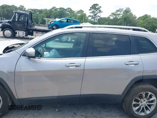 2019 Jeep Cherokee Latitude Plus with VIN 1C4PJLLB3KD184842, listed as a IAAI auction lot 42389142 with 123,324 mi miles and . Bid and sale history available at DreamBid. Image 14.