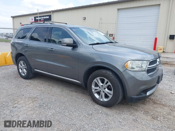 2012 Dodge Durango Crew with VIN 1C4RDJDG7CC112628, listed as a IAAI auction lot 42167214 with 144,898 mi miles and . Bid and sale history available at carsss.com. Image 1.