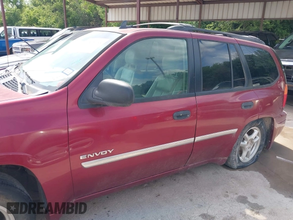 2006 GMC Envoy SLE z VIN 1GKDS13S362314323, wystawiony jako IAAI lot #42476958 z przebiegiem 164 322 mil mil oraz . Historia ofert i sprzedaży dostępna na DreamBid. Obrazek 6.