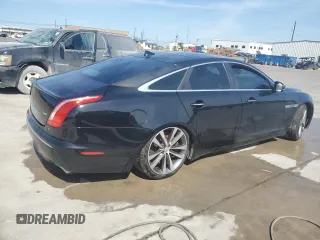 2015 Jaguar XJ with VIN SAJWA3HT8FMV90846, listed as a Copart auction lot 67423804 with 144,516 mi miles and Clean Title. Bid and sale history available at DreamBid. Image 3.