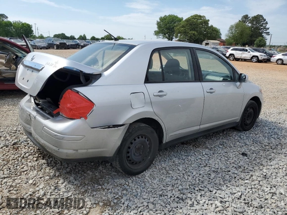 2011 Nissan Versa S with VIN 3N1BC1AP3BL452650, listed as a Copart auction lot 52206885 with 168,427 mi miles and Salvage title. Bid and sale history available at DreamBid. Image 3.