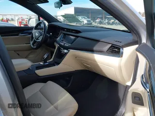 2019 Cadillac XT5 FWD z VIN 1GYKNARS9KZ244873, wystawiony jako IAAI lot #41164998 z przebiegiem 26 314 mil mil oraz . Historia ofert i sprzedaży dostępna na DreamBid. Obrazek 5.