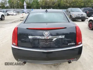 2009 Cadillac CTS AWD w/1SA with VIN 1G6DH577590123416, listed as a Copart auction lot 48297495 with 142,728 mi miles and Salvage Title. Bid and sale history available at carsss.com. Image 6.