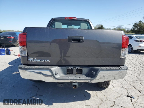 2013 Toyota Tundra z VIN 5TFRM5F1XDX065735, wystawiony jako Copart lot #52385275 z przebiegiem 166 233 mil mil oraz Czysty tytuł • Clean title. Historia ofert i sprzedaży dostępna na DreamBid. Obrazek 6.