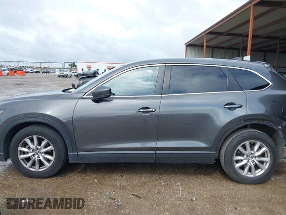 2016 Mazda CX-9 Sport with VIN JM3TCABY5G0122478, listed as a IAAI auction lot 42115795 with 134,980 mi miles and . Bid and sale history available at DreamBid. Image 14.
