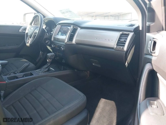 2023 Ford Ranger XL with VIN 1FTER4EH3PLE02170, listed as a IAAI auction lot 40761384 with 35,584 mi miles. Bid and sale history available at carsss.com. Image 5.