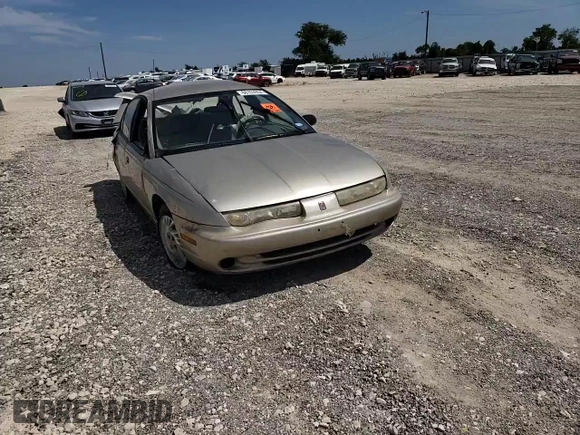 1998 Saturn SL z VIN 1G8ZK5271WZ265579, wystawiony jako Copart lot #68153934 z przebiegiem Nie podano mil oraz Szkoda całkowita • Salvage title. Historia ofert i sprzedaży dostępna na DreamBid. Obrazek 11.