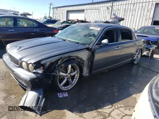2005 Jaguar XJ VDP with VIN SAJWA82C65SG42753, listed as a Copart auction lot 73792534 with 141,936 mi miles and Salvage Title. Bid and sale history available at carsss.com. Image 1.