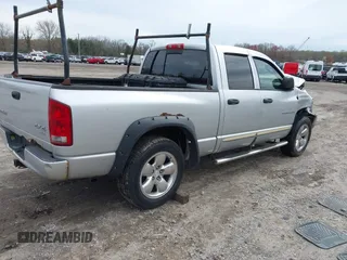 2004 Dodge 1500 SLT with VIN 1D7HU18D14J216675, listed as a IAAI auction lot 41967225 with 237,692 mi miles. Bid and sale history available at carsss.com. Image 4.